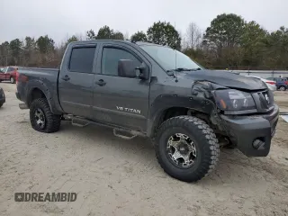 2010 Nissan Titan LE with VIN 1N6BA0ECXAN310425, listed as a Copart auction lot 88897755 with 132,467 mi miles and Salvage Title. Bid and sale history available at carsss.com. Image 4.