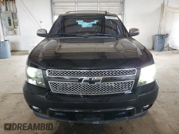 2010 Chevrolet Tahoe LTZ with VIN 1GNUKCE05AR236038, listed as a Copart auction lot 63033425 with 132,236 mi miles and Salvage title. Bid and sale history available at DreamBid. Image 5.