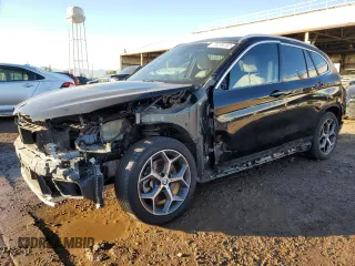 2018 BMW X1 xDrive28i with VIN WBXHT3C37J3H32374, listed as a Copart auction lot 70226702 with 65,796 mi miles. Bid and sale history available at carsss.com. Image 1.