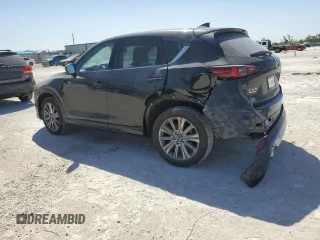 2024 Mazda CX-5 2.5 Turbo Signature with VIN JM3KFBXY2R0354346, listed as a Copart auction lot 49260525 with 9,571 mi miles and Salvage Title. Bid and sale history available at carsss.com. Image 2.