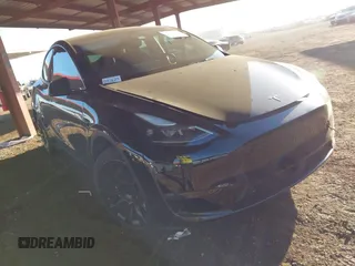 2023 Tesla Model Y Long Range z VIN 7SAYGDEE8PF815622, wystawiony jako IAAI lot #41515433 z przebiegiem 70 862 mil mil oraz . Historia ofert i sprzedaży dostępna na DreamBid. Obrazek 1.