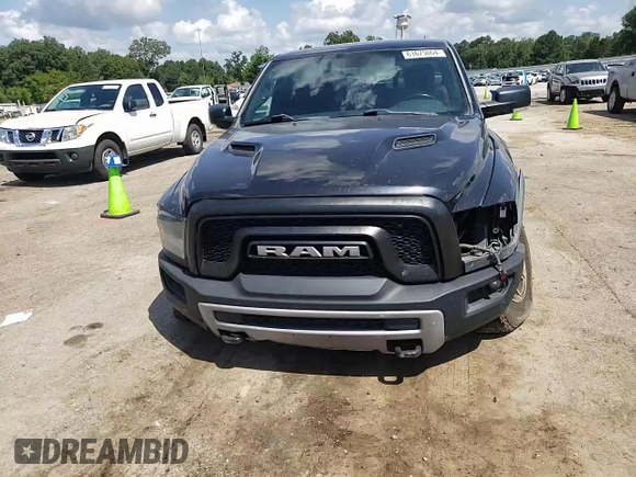 2015 Ram 1500 Rebel z VIN 1C6RR7YT4FS751370, wystawiony jako Copart lot #61675064 z przebiegiem 90 245 mil mil oraz Szkoda całkowita • Salvage title. Historia ofert i sprzedaży dostępna na DreamBid. Obrazek 11.