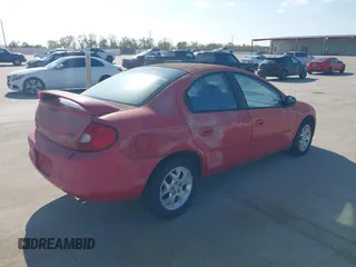 2002 Dodge Neon SXT with VIN 1B3ES56C02D627244, listed as a IAAI auction lot 41047832 with 65,827 mi miles. Bid and sale history available at carsss.com. Image 4.