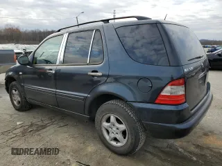 2001 Mercedes-Benz M-Class with VIN 4JGAB54E61A276417, listed as a Copart auction lot 82878094 with 205,577 mi miles and Salvage Title. Bid and sale history available at carsss.com. Image 2.