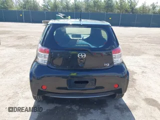 2012 Scion iQ with VIN JTNJJXB03CJ018302, listed as a IAAI auction lot 42000097 with 191,918 mi miles. Bid and sale history available at carsss.com. Image 17.