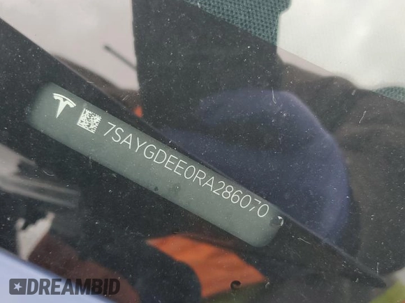 2024 Tesla Model Y Long Range z VIN 7SAYGDEE0RA286070, wystawiony jako Copart lot #58200425 z przebiegiem 16 881 mil mil oraz Szkoda całkowita • Salvage title. Historia ofert i sprzedaży dostępna na DreamBid. Obrazek 13.