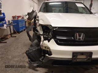 2021 Honda Pilot Special Edition z VIN 5FNYF6H26MB086397, wystawiony jako IAAI lot #41162732 z przebiegiem 94 246 mil mil oraz . Historia ofert i sprzedaży dostępna na DreamBid. Obrazek 6.