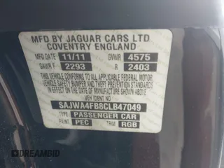 2012 Jaguar XK with VIN SAJWA4FB8CLB47049, listed as a IAAI auction lot 42118136 with 60,953 mi miles. Bid and sale history available at carsss.com. Image 9.