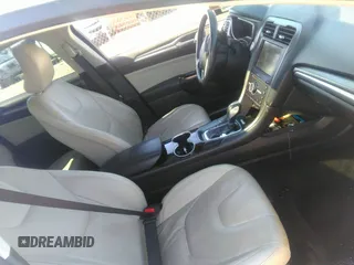 2016 Ford Fusion Titanium with VIN 3FA6P0K93GR331947, listed as a IAAI auction lot 41828409 with 181,555 mi miles and . Bid and sale history available at DreamBid. Image 5.