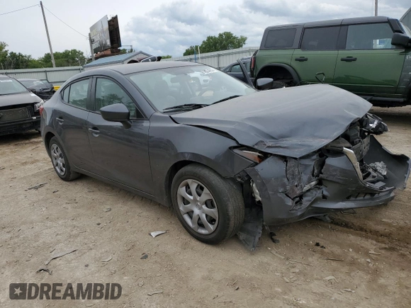 2015 Mazda 3 i Sport with VIN 3MZBM1U73FM130156, listed as a Copart auction lot 56034935 with 154,560 mi miles and Salvage title. Bid and sale history available at DreamBid. Image 4.