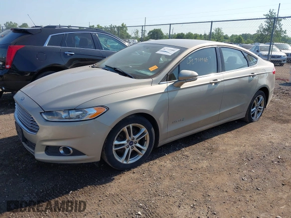 2015 Ford Fusion SE Hybrid with VIN 3FA6P0LU7FR243498, listed as a IAAI auction lot 42719986 with 345,098 mi miles and . Bid and sale history available at DreamBid. Image 2.