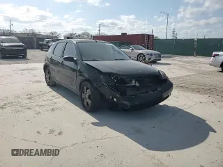 2006 Ford Focus S z VIN 1FAHP37N36W176473, wystawiony jako Copart lot #53781985 z przebiegiem 154 954 mil mil oraz Szkoda całkowita • Salvage title. Historia ofert i sprzedaży dostępna na DreamBid. Obrazek 13.