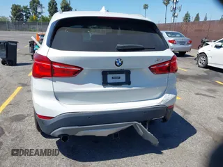 2017 BMW X1 xDrive28i with VIN WBXHT3C33H5F86831, listed as a IAAI auction lot 42019082 with 74,708 mi miles and . Bid and sale history available at DreamBid. Image 16.