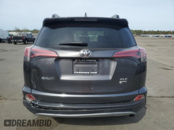 2018 Toyota RAV4 XLE with VIN JTMRFREV5JJ739973, listed as a Copart auction lot 54490225 with 65,807 mi miles and Salvage Title. Bid and sale history available at DreamBid. Image 6.
