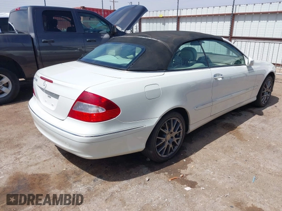 2007 Mercedes-Benz CLK 3.5L with VIN WDBTK56F47T075999, listed as a IAAI auction lot 41915608 with 164,654 mi miles. Bid and sale history available at carsss.com. Image 4.