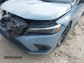 2023 Honda Civic Sport with VIN 2HGFE2F5XPH546709, listed as a IAAI auction lot 42453213 with 46,768 mi miles and . Bid and sale history available at DreamBid. Image 6.