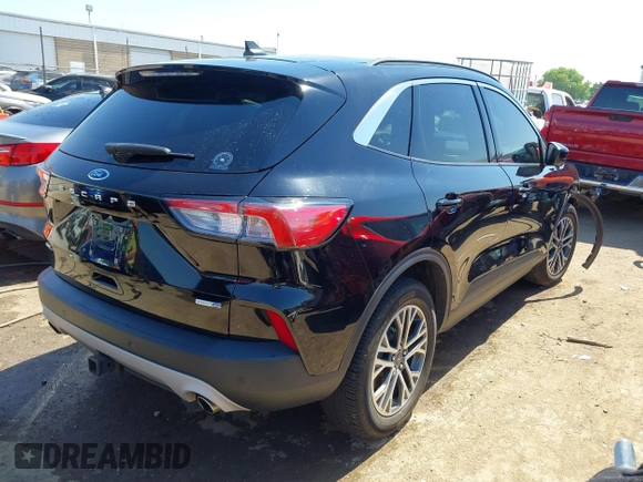 2020 Ford Escape SEL z VIN 1FMCU9H91LUB86584, wystawiony jako IAAI lot #42268456 z przebiegiem 94 753 mil mil oraz . Historia ofert i sprzedaży dostępna na DreamBid. Obrazek 4.