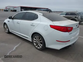2015 Kia Optima SX Turbo with VIN 5XXGR4A69FG361006, listed as a IAAI auction lot 41870382 with 150,084 mi miles. Bid and sale history available at carsss.com. Image 3.