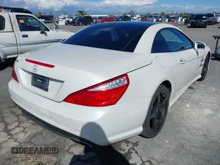 2013 Mercedes-Benz SL-Class SL 550 with VIN WDDJK7DA7DF005702, listed as a IAAI auction lot 41785274 with 143,569 mi miles. Bid and sale history available at carsss.com. Image 4.