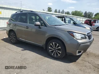 2017 Subaru Forester Touring with VIN JF2SJGWC9HH402713, listed as a Copart auction lot 62257345 with 128,903 mi miles and Salvage title. Bid and sale history available at DreamBid. Image 4.