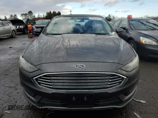 2018 Ford Fusion SE with VIN 3FA6P0H74JR170974, listed as a Copart auction lot 47134295 with 148,023 mi miles and Salvage Title. Bid and sale history available at DreamBid. Image 5.