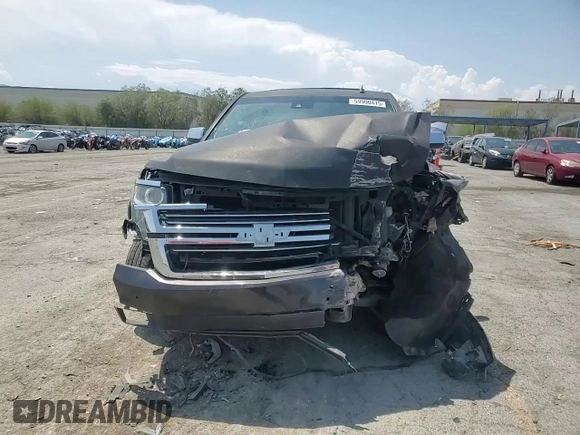 2015 Chevrolet Tahoe LTZ with VIN 1GNSKCKC2FR157035, listed as a Copart auction lot 59990415 with Not provided miles and Salvage title. Bid and sale history available at DreamBid. Image 14.