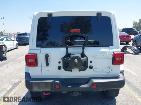 2018 Jeep Wrangler Unlimited Rubicon with VIN 1C4HJXFN8JW215023, listed as a IAAI auction lot 42227099 with 62,195 mi miles and . Bid and sale history available at DreamBid. Image 16.