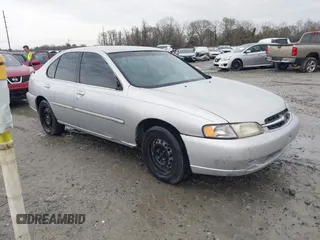 1999 Nissan Altima XE with VIN 1N4DL01D5XC180276, listed as a IAAI auction lot 41584645 with 248,376 mi miles. Bid and sale history available at carsss.com. Image 1.
