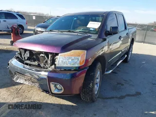 2012 Nissan Titan S with VIN 1N6AA0EJ0CN320474, listed as a IAAI auction lot 41601710 with 169,323 mi miles. Bid and sale history available at carsss.com. Image 2.