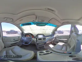 2005 Honda Odyssey Touring z VIN 5FNRL38805B131416, wystawiony jako Copart lot #59157395 z przebiegiem 263 087 mil mil oraz Szkoda całkowita • Salvage title. Historia ofert i sprzedaży dostępna na DreamBid. Obrazek 15.