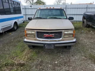 1996 GMC Sierra 1500 with VIN 1GTHC33J4TF010466, listed as a Copart auction lot 48392195 with 143,267 mi miles and Salvage Title. Bid and sale history available at DreamBid. Image 5.