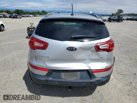 2012 Kia Sportage EX with VIN KNDPCCA2XC7252292, listed as a Copart auction lot 56975535 with 160,445 mi miles and Salvage title. Bid and sale history available at DreamBid. Image 6.