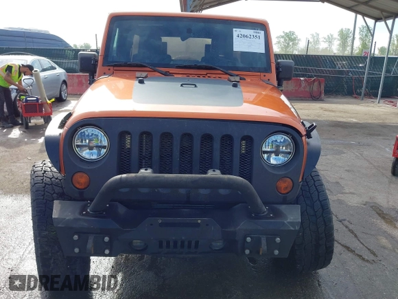 2010 Jeep Wrangler Unlimited Sport with VIN 1J4HA3H1XAL189667, listed as a IAAI auction lot 42062351 with 144,838 mi miles. Bid and sale history available at carsss.com. Image 12.