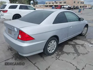 2004 Honda Civic LX with VIN 1HGEM22574L004759, listed as a IAAI auction lot 41928285 with 194,580 mi miles. Bid and sale history available at carsss.com. Image 4.