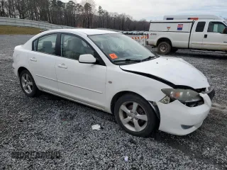 2005 Mazda 3 i with VIN JM1BK12F851282187, listed as a Copart auction lot 45145815 with 219,920 mi miles and Salvage Title. Bid and sale history available at DreamBid. Image 4.