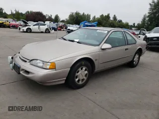 1995 Ford Thunderbird LX with VIN 1FALP62W45H169199, listed as a Copart auction lot 65458964 with 111,726 mi miles and Salvage Title. Bid and sale history available at DreamBid. Image 1.