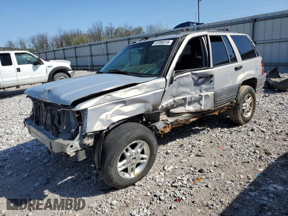 1997 Jeep Grand Cherokee Laredo with VIN 1J4GZ58S5VC561060, listed as a Copart auction lot 52098315 with 267,245 mi miles and Salvage title. Bid and sale history available at DreamBid. Image 1.