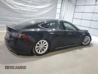 2016 Tesla Model S 90D with VIN 5YJSA1E49GF124514, listed as a Copart auction lot 53864125 with Not provided miles and Salvage title. Bid and sale history available at DreamBid. Image 3.
