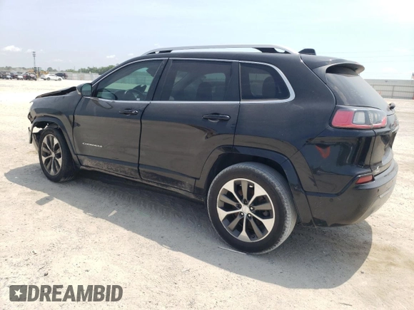 2019 Jeep Cherokee z VIN 1C4PJLJN0KD215834, wystawiony jako Copart lot #57652975 z przebiegiem 127 986 mil mil oraz Czysty tytuł • Clean title. Historia ofert i sprzedaży dostępna na DreamBid. Obrazek 2.