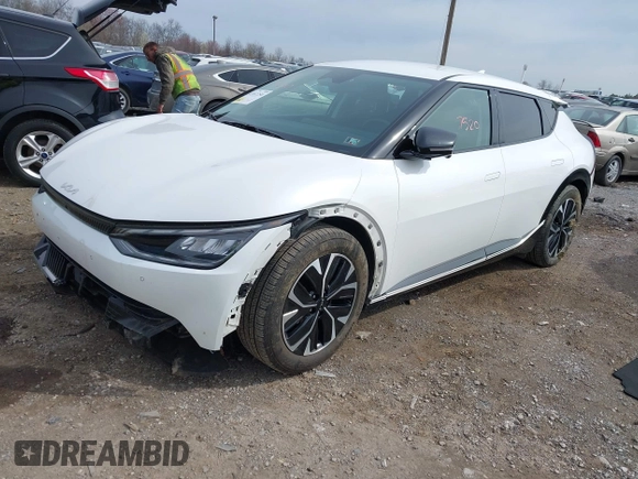2022 Kia EV6 Wind z VIN KNDC3DLC5N5039405, wystawiony jako IAAI lot #41937250 z przebiegiem 55 659 mil mil oraz . Historia ofert i sprzedaży dostępna na DreamBid. Obrazek 2.