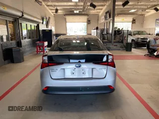 2020 Toyota Prius L Eco z VIN JTDKARFU2L3107977, wystawiony jako IAAI lot #42571708 z przebiegiem 204 781 mil mil oraz . Historia ofert i sprzedaży dostępna na DreamBid. Obrazek 11.