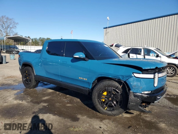 2022 Rivian R1T Launch Edition z VIN 7FCTGAAL7NN000539, wystawiony jako Copart lot #87811245 z przebiegiem Nie podano mil oraz Szkody całkowita. Historia ofert i sprzedaży dostępna na DreamBid. Obrazek 4.