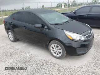 2015 Kia Rio LX with VIN KNADM4A3XF6453521, listed as a IAAI auction lot 42084653 with 94,724 mi miles. Bid and sale history available at carsss.com. Image 1.