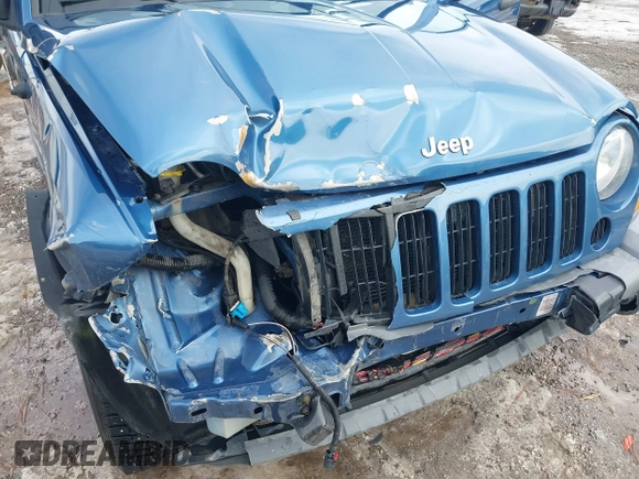 2005 Jeep Liberty Sport with VIN 1J4GL48K45W599048, listed as a IAAI auction lot 41603457 with 107,781 mi miles. Bid and sale history available at carsss.com. Image 6.