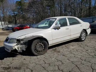 2001 Mazda 626 LX with VIN 1YVGF22C815240640, listed as a Copart auction lot 47609315 with 0 mi miles and Salvage Title. Bid and sale history available at carsss.com. Image 1.