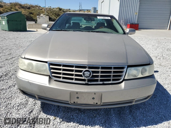 2000 Cadillac Seville Touring STS z VIN 1G6KY5498YU255607, wystawiony jako Copart lot #71130714 z przebiegiem 146 046 mil mil oraz Szkoda całkowita • Salvage title. Historia ofert i sprzedaży dostępna na DreamBid. Obrazek 5.