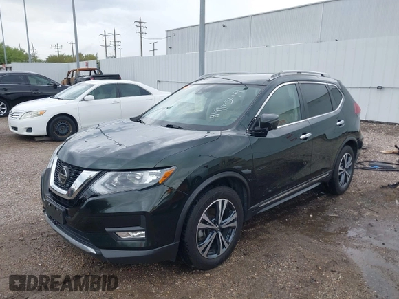 2018 Nissan Rogue SV with VIN 5N1AT2MT8JC833777, listed as a IAAI auction lot 41910544 with 112,713 mi miles and . Bid and sale history available at carsss.com. Image 18.