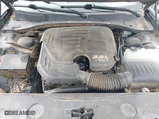 2013 Dodge Charger SXT Plus with VIN 2C3CDXHG4DH574361, listed as a IAAI auction lot 42048854 with 178,735 mi miles. Bid and sale history available at carsss.com. Image 10.