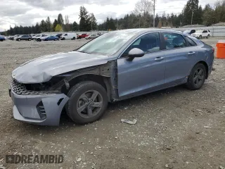2021 Kia K5 LXS with VIN 5XXG14J26MG040932, listed as a Copart auction lot 52127935 with 69,598 mi miles and Salvage Title. Bid and sale history available at carsss.com. Image 1.