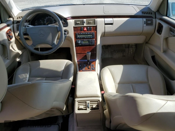 1999 Mercedes-Benz E-Class with VIN WDBJF65H5XA804902, listed as a Copart auction lot 73704634 with 92,411 mi miles and Salvage Title. Bid and sale history available at carsss.com. Image 8.